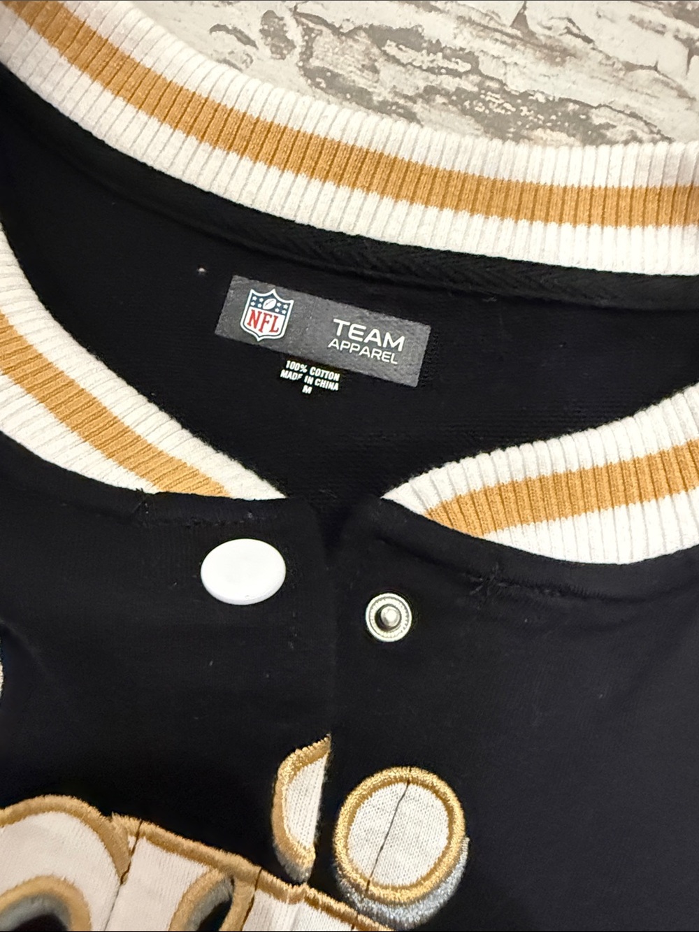 NFL Saints Black White and Gold Varsity Jacket - Picture 2 of 5